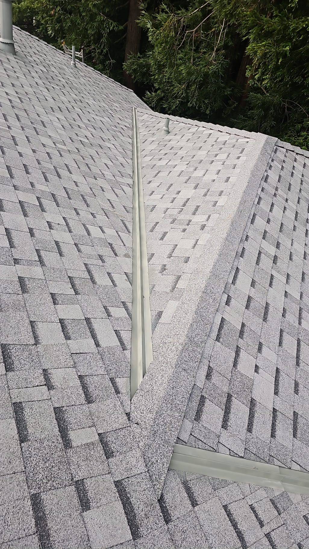 Roofing contractor San Jose homeowner reviewing a signed contract before a roof repair or replacement